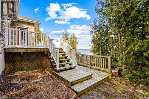 Stairs to water level decking and shoreline areas. - 157 Georgian Dr Drive, Northern Bruce Peninsula, ON - Outdoor With Deck Patio Veranda