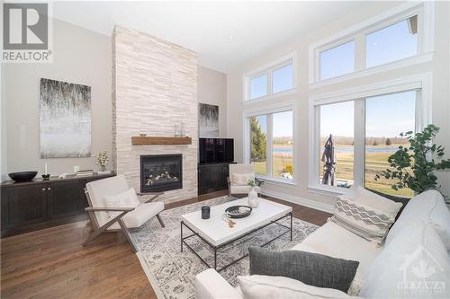 100 Equinelle Drive, Kemptville, ON - Indoor Photo Showing Living Room With Fireplace