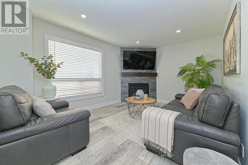 408 Vanier Drive, Milton, ON - Indoor Photo Showing Living Room With Fireplace