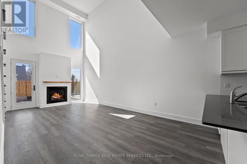 #2 -19 West St N, Kawartha Lakes, ON - Indoor With Fireplace