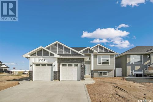 810 Weir Crescent, Warman, SK - Outdoor With Facade