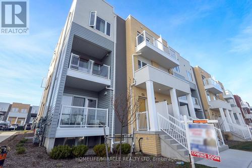 122 Seabrook Dr, Kitchener, ON - Outdoor With Balcony With Facade