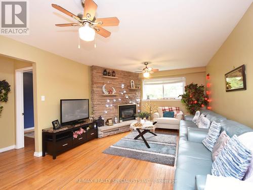 2054 Davebrook Rd, Mississauga, ON - Indoor Photo Showing Living Room With Fireplace