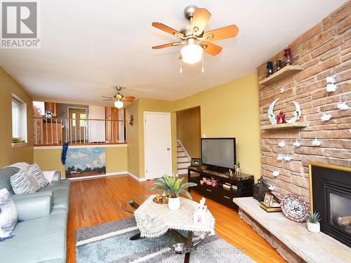 2054 Davebrook Rd, Mississauga, ON - Indoor Photo Showing Living Room With Fireplace