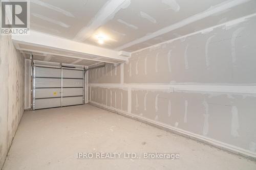 #67 -80 Knotsberry Circ, Brampton, ON - Indoor Photo Showing Garage