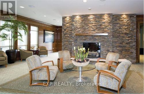 #225 -50 Lakebreeze Dr, Clarington, ON - Indoor With Fireplace