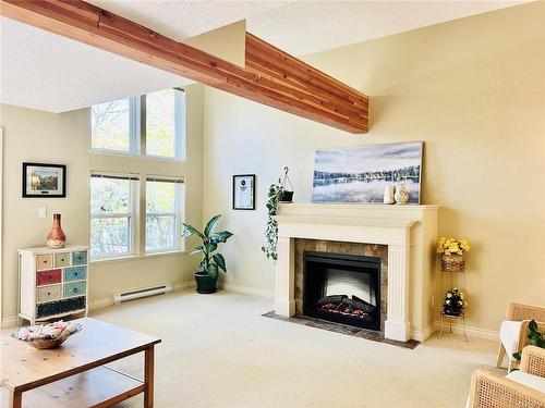 5-1405 Mallek Cres, Victoria, BC - Indoor Photo Showing Living Room With Fireplace