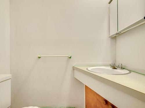 Powder room - 19 Av. Des Ardennes, Estérel, QC - Indoor Photo Showing Bathroom