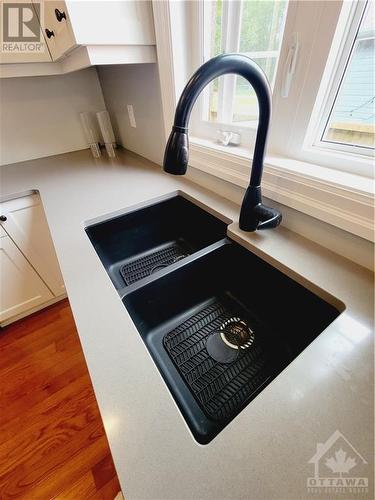 Upgraded sink with sprayer faucet - 653 Bayview Drive, Constance Bay, ON - Indoor Photo Showing Kitchen