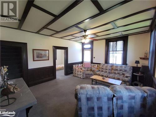 Large Living Room With 9 Foot Ceilings - 13 Main Street, Sundridge, ON - Indoor With Fireplace