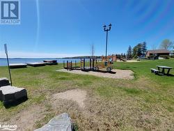 Walk to the lake - splash pad, playground, boat launch, and picnic area. - 