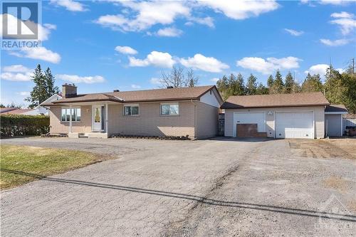 Loads of parking spaces.  Ideal for business - including horseshoe driveway to get back on the road. - 2029 Carp Road, Carp, ON - Outdoor