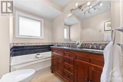 Nice deep jet tub and vanity - 2029 Carp Road, Carp, ON - Indoor Photo Showing Bathroom