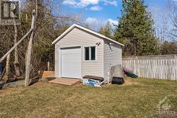 Shed is included.  Has concrete floor.  It is insulated and drywalled and has power. - 