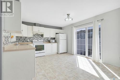 2764 Cranbourn Crescent, Regina, SK - Indoor Photo Showing Kitchen With Double Sink