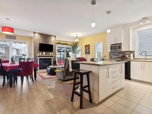 Vue d'ensemble - 77 Boul. De La Cité, Gatineau (Gatineau), QC - Indoor Photo Showing Kitchen With Fireplace With Upgraded Kitchen