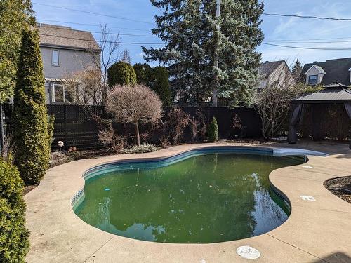 Pool - 2595 Rue Des Pintades, Laval (Sainte-Rose), QC - Outdoor With In Ground Pool With Backyard