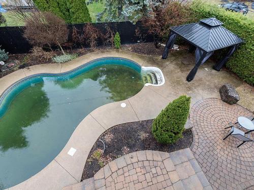 Backyard - 2595 Rue Des Pintades, Laval (Sainte-Rose), QC - Outdoor With In Ground Pool