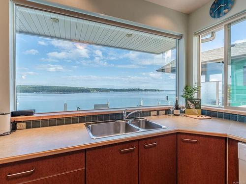 8-245 Oyster Cove Rd, Ladysmith, BC - Indoor Photo Showing Kitchen With Body Of Water With Double Sink