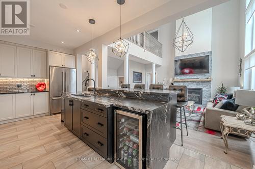 1 Riverwalk Place, Midland, ON - Indoor Photo Showing Kitchen With Fireplace With Double Sink With Upgraded Kitchen