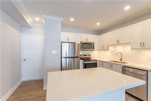 112 St. Joseph'S Drive|Unit #202, Hamilton, ON - Indoor Photo Showing Kitchen With Stainless Steel Kitchen With Double Sink With Upgraded Kitchen