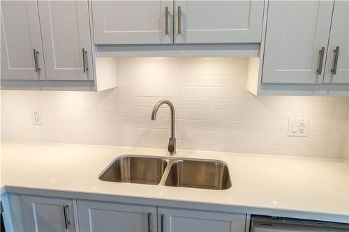 112 St. Joseph'S Drive|Unit #202, Hamilton, ON - Indoor Photo Showing Kitchen With Double Sink