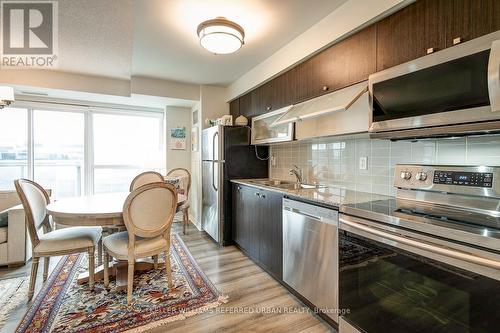 #214 -275 Yorkland Rd, Toronto, ON - Indoor Photo Showing Kitchen With Stainless Steel Kitchen With Double Sink