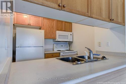 #512 -889 Bay St, Toronto, ON - Indoor Photo Showing Kitchen With Double Sink