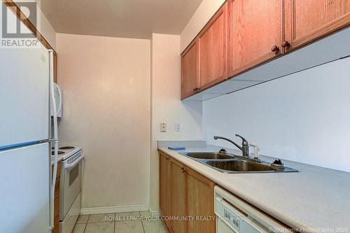 #512 -889 Bay St, Toronto, ON - Indoor Photo Showing Kitchen With Double Sink