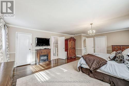25 Alcaine Crt, Markham, ON - Indoor Photo Showing Bedroom With Fireplace