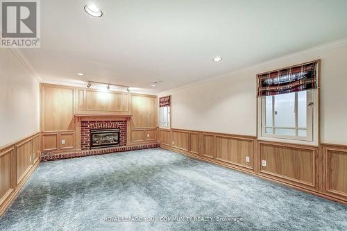 25 Alcaine Crt, Markham, ON - Indoor Photo Showing Other Room With Fireplace