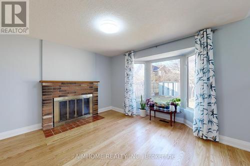 153 Wintermute Blvd, Toronto, ON - Indoor Photo Showing Living Room With Fireplace