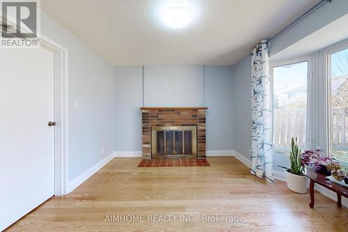 153 Wintermute Blvd, Toronto, ON - Indoor Photo Showing Living Room With Fireplace