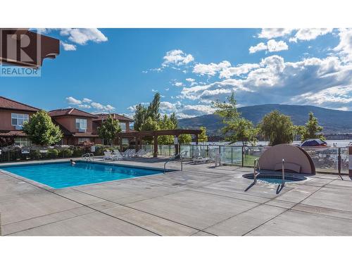 7600 Cottonwood Drive Unit# 206, Osoyoos, BC - Outdoor With In Ground Pool With View
