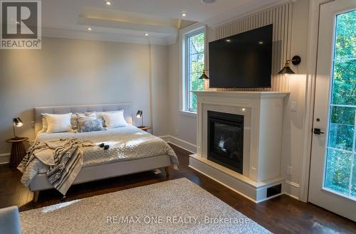 64 Ravina Cres, Hamilton, ON - Indoor Photo Showing Bedroom With Fireplace