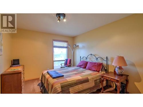 6488 Farmers Drive, Kelowna, BC - Indoor Photo Showing Bedroom