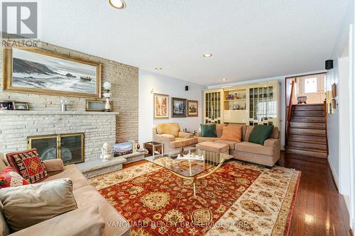 15 Eldorado Crt, Toronto, ON - Indoor Photo Showing Living Room With Fireplace