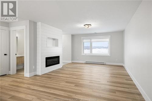 286 Teaberry, Moncton, NB - Indoor Photo Showing Other Room With Fireplace