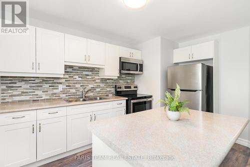 31 Mississaga Street W, Orillia, ON - Indoor Photo Showing Kitchen With Double Sink
