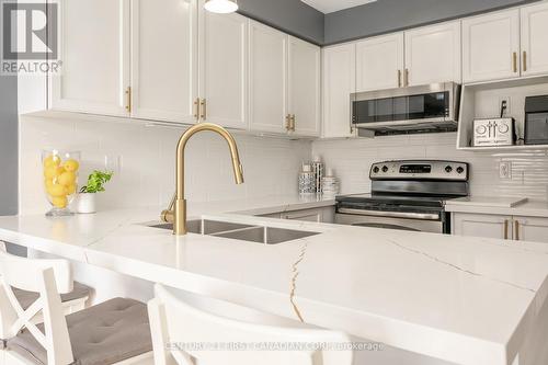 #64 -10 Rossmore Crt, London, ON - Indoor Photo Showing Kitchen With Double Sink With Upgraded Kitchen