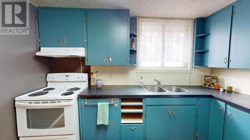 8520 97 Avenue, Fort St. John, BC - Indoor Photo Showing Kitchen With Double Sink