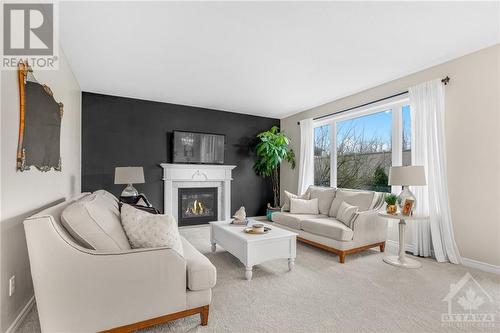 1486 Comfrey Crescent, Ottawa, ON - Indoor Photo Showing Living Room With Fireplace