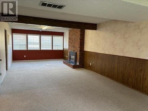 4665 Fordham Road, Kelowna, BC - Indoor Photo Showing Other Room With Fireplace