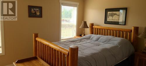 72 Tomkinson Road, Grindrod, BC - Indoor Photo Showing Bedroom