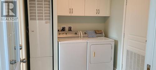 72 Tomkinson Road, Grindrod, BC - Indoor Photo Showing Laundry Room