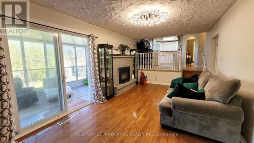 568 Canewood Cres, Waterloo, ON - Indoor Photo Showing Living Room With Fireplace