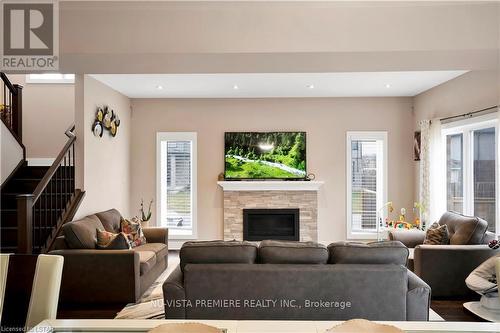 1552 Sandridge Ave, London, ON - Indoor Photo Showing Living Room With Fireplace