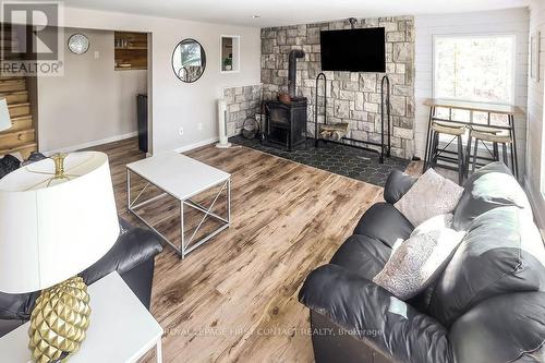 1367 Lauzon Village Rd, The North Shore, ON - Indoor Photo Showing Living Room With Fireplace