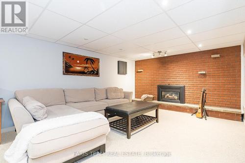 128 Springdale Dr, Barrie, ON - Indoor Photo Showing Living Room With Fireplace
