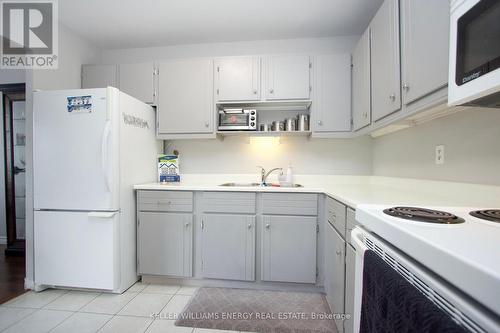 #204 -131 Taunton Rd E, Oshawa, ON - Indoor Photo Showing Kitchen With Double Sink